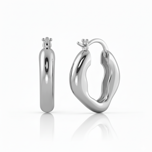 Silver hoop earrings on Gulban Demi Fine Jewellery
