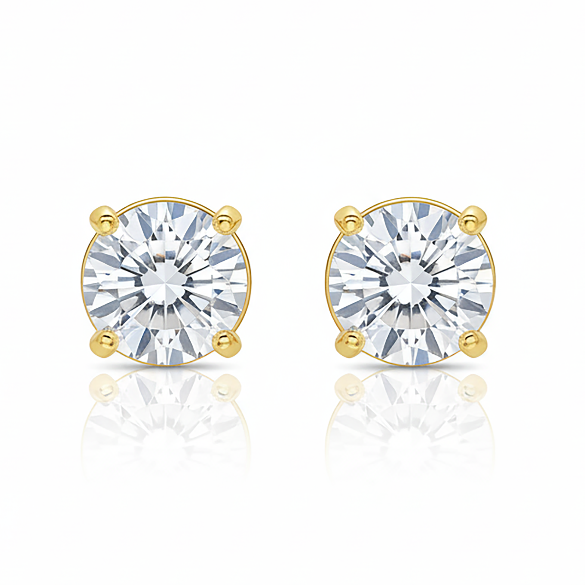 Gold earrings with clear gemstones on Gulban Demi Fine Jewellery