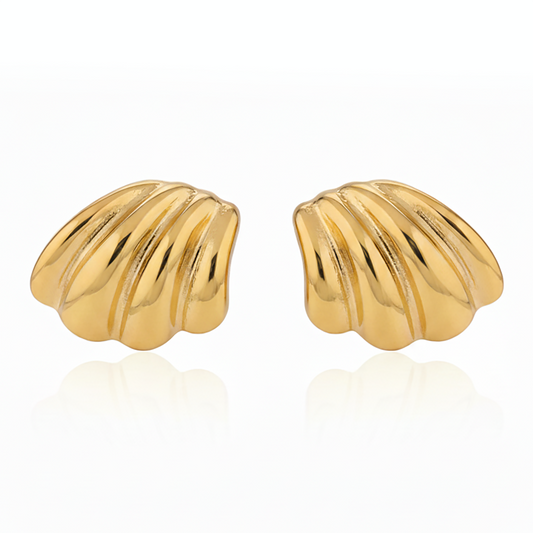Gold wing earrings on Gulban Demi Fine Jewellery